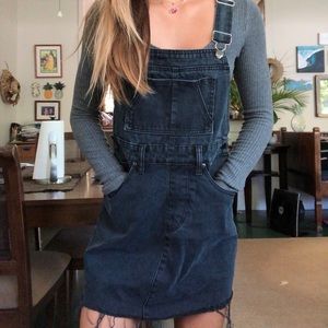 Super cute overall dress.